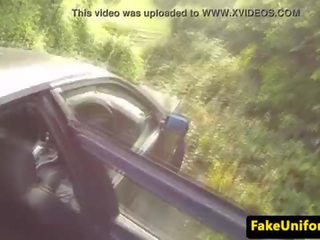 Real brit sucking fake coppers phallus in car